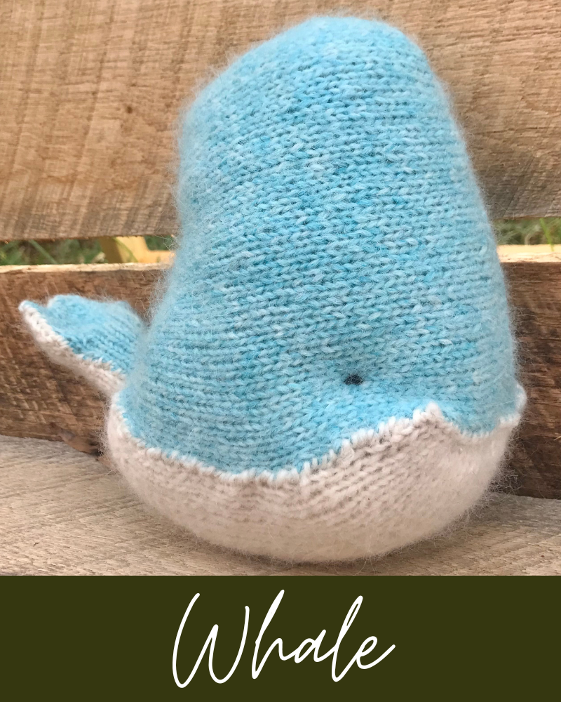 featured image for whale, blue knit whale on wood background with white letters saying whale over green background