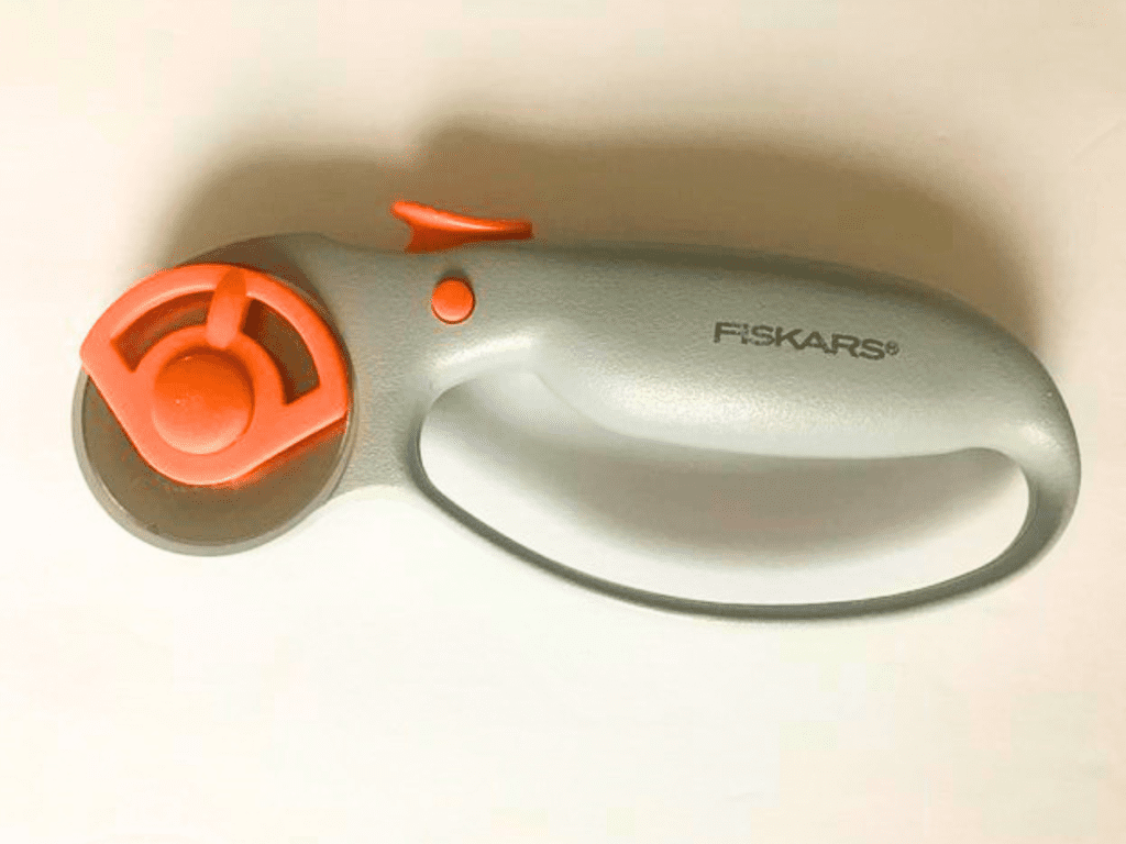 Fiskars rotary cutter on white background